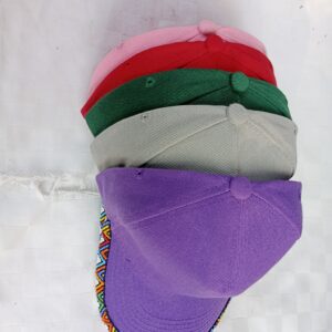 Store Baseball cap with a hand-beaded colorful zigzag trim along the brim — a fun, handmade twist on a classic cap, available in multiple colors.