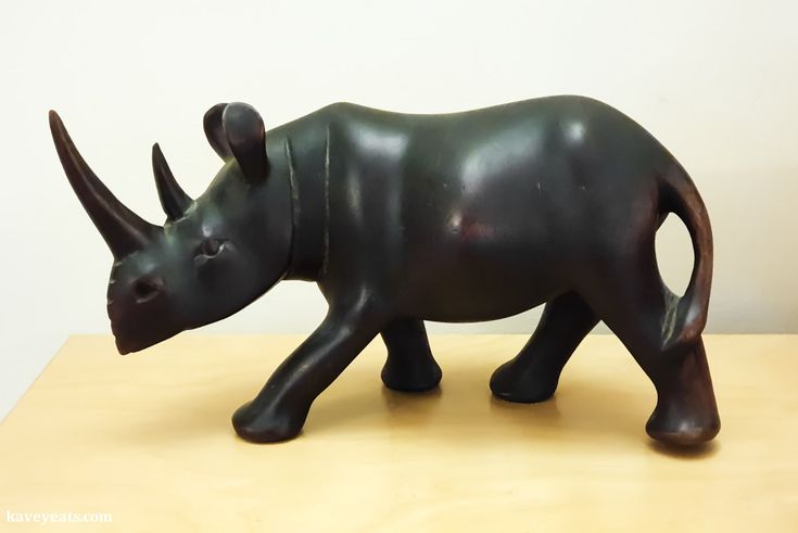 Hand-Carved Wooden Rhino Statue – African Wildlife Sculpture